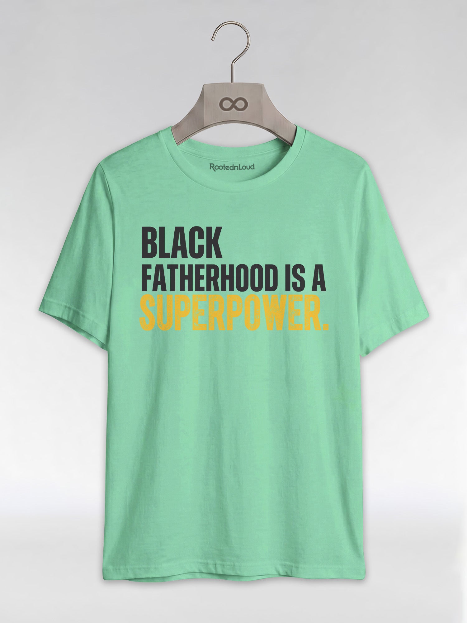 Black Fatherhood Is A Superpower: Proud Black Dad Graphic T-Shirt - RootednLoud