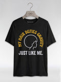 My Hair Defies Gravity Just Like Me: Black Girl Magic Afro Graphic T-Shirt - RootednLoud